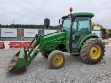 Image of John Deere 4320 4wd Cabbed Compact Tractor