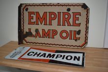 Image of Champion Spark Plug and Empire Lamp Oil Signs
