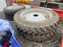 Image of Set Of Row Crop Wheels - Removed from MF 7S.210 Dyna-VT with flanged front and rear axles. 80" track width