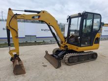 Image of CAT 302 Cabbed Mini Excavator