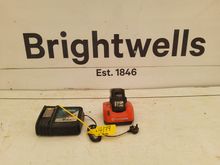 Image of Makita Battery Charger, Husqvarna Battery and Charger