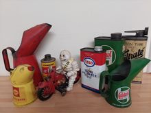 Image of Automobilia Misc lubricant jugs, tins & Michelin man riding mo