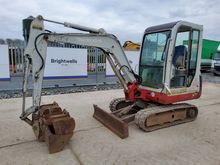 Image of Takeuchi TB125 Cabbed Mini Excavator