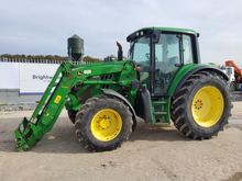 Image of John Deere 6115M 4wd Tractor