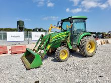 Image of John Deere 4320 4wd Cabbed Compact Tractor