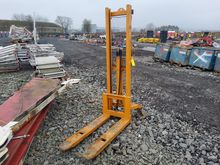 Image of Four Wheel Pallet Lift Truck