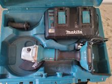 Image of Makita DGA700 Angle Grinder with Charger