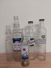 Image of Automobilia Five vintage glass oil bottles