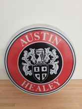 Image of Automobilia Three large round branded signs